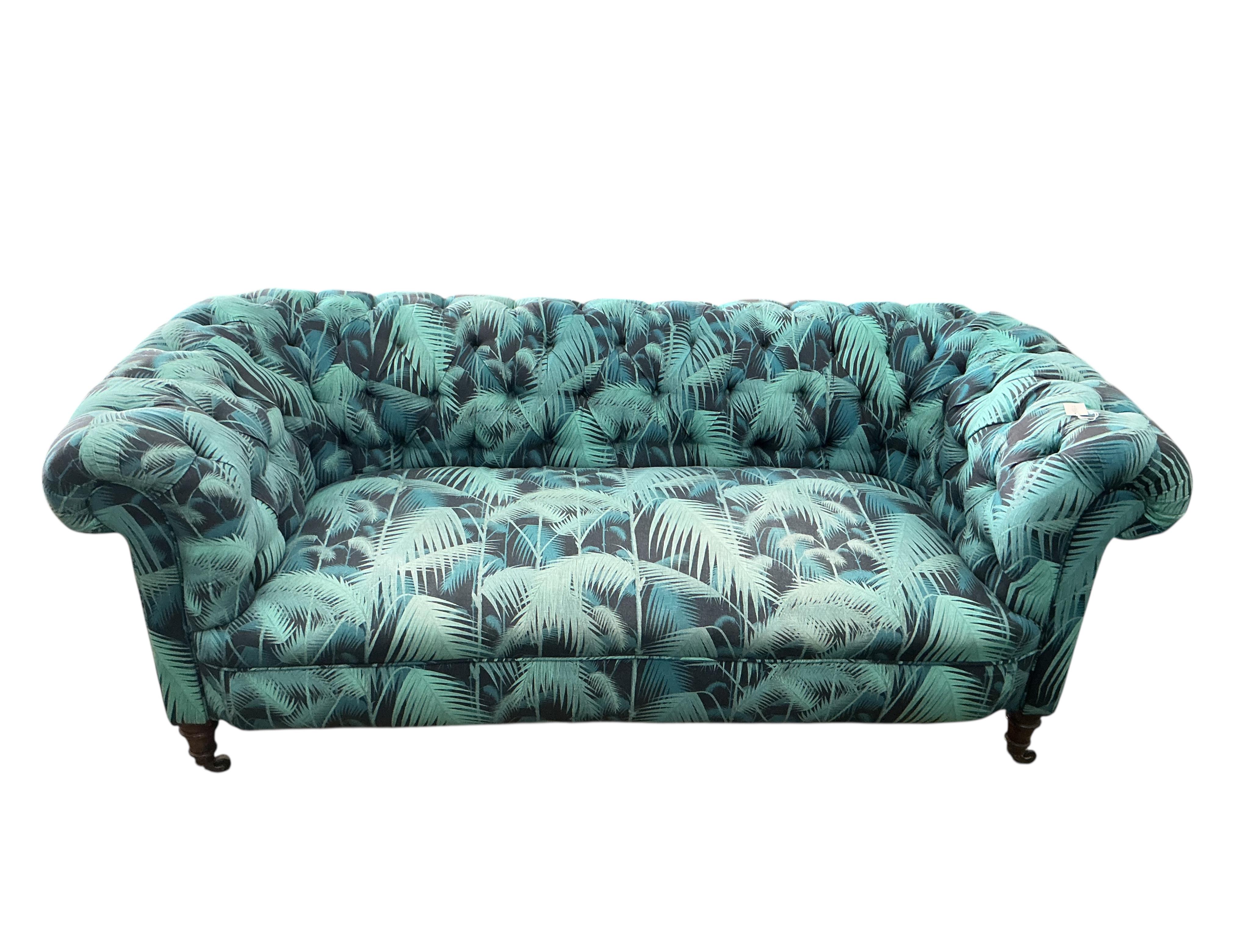 A late Victorian upholstered Chesterfield settee, width 190cm, depth 80cm, height 75cm